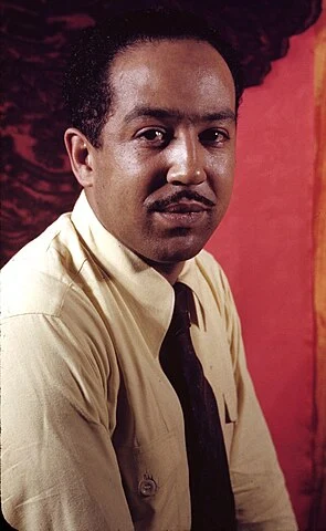 "Langston Hughes, a leading figure of the Harlem Renaissance, best known for his poem 'Hold Fast to Dreams